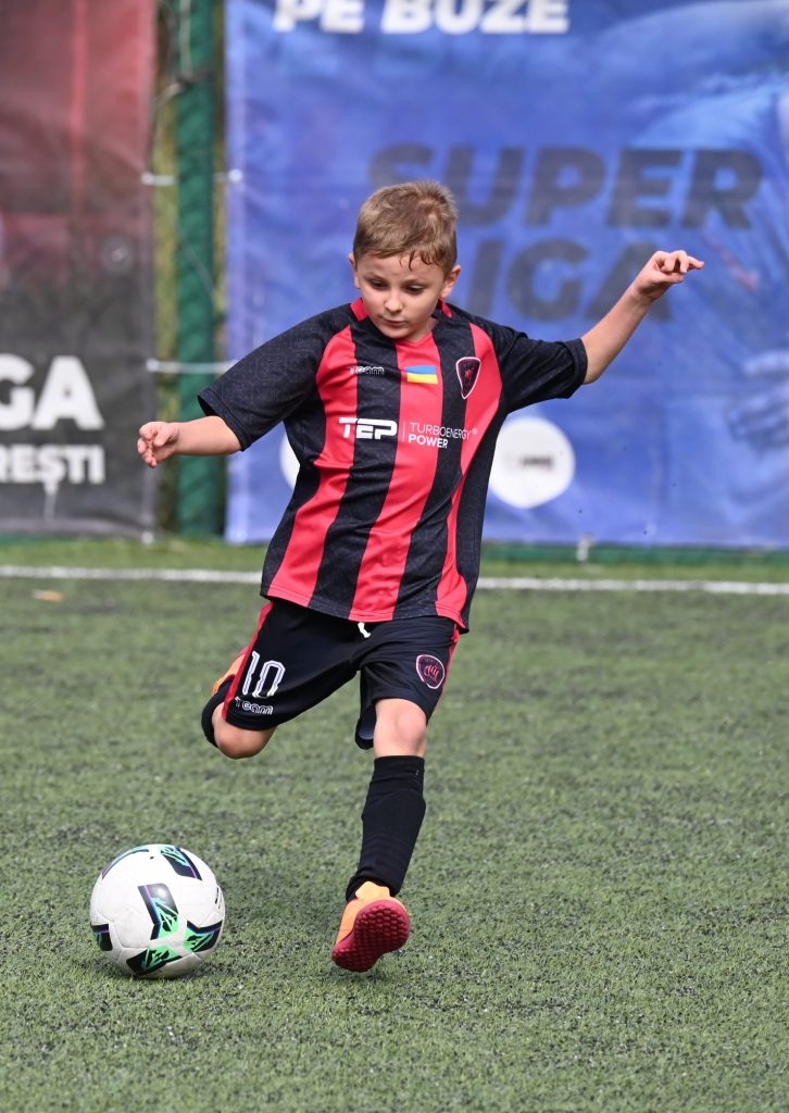 Player kicking the ball